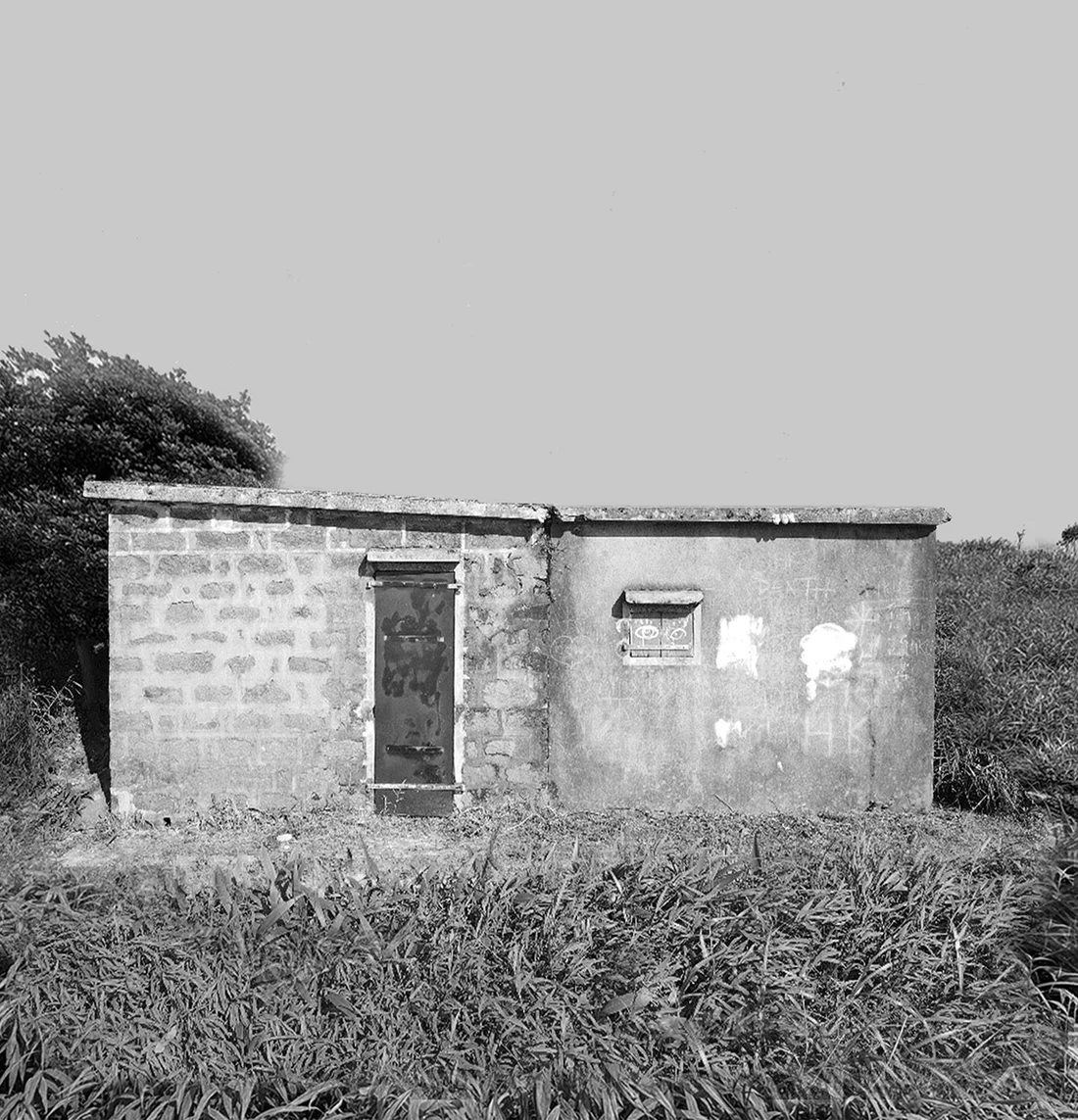Caretaker's Hut before restoration Weathered exterior of the disused 1925 Caretaker's Hut before conservation work